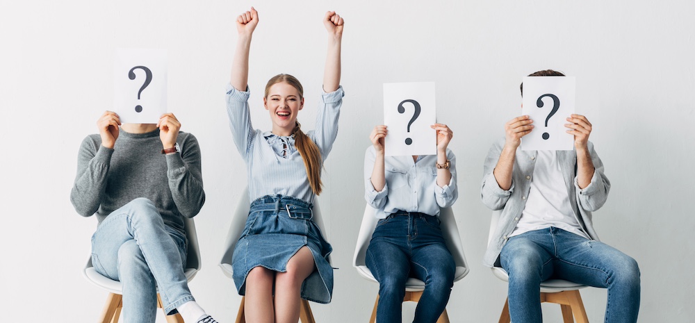 smiling woman showing yes gesture near employees h 2023 11 27 05 28 23 utc 1